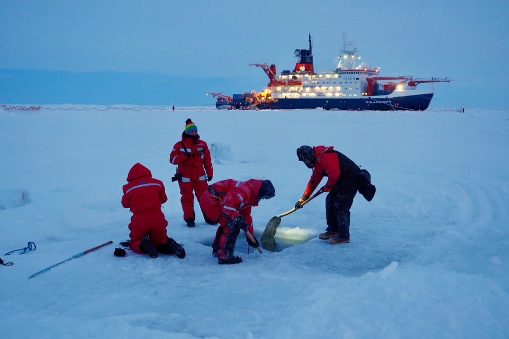 Research work on the sea ice nearby the research vessel Polarstern